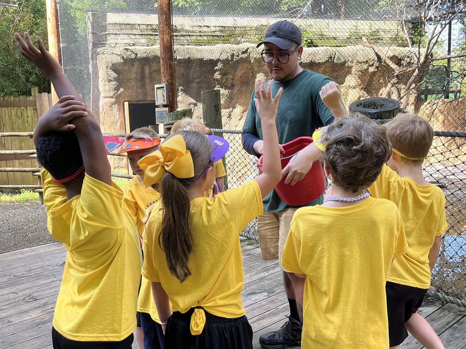 keeper speaking with summer safari campers