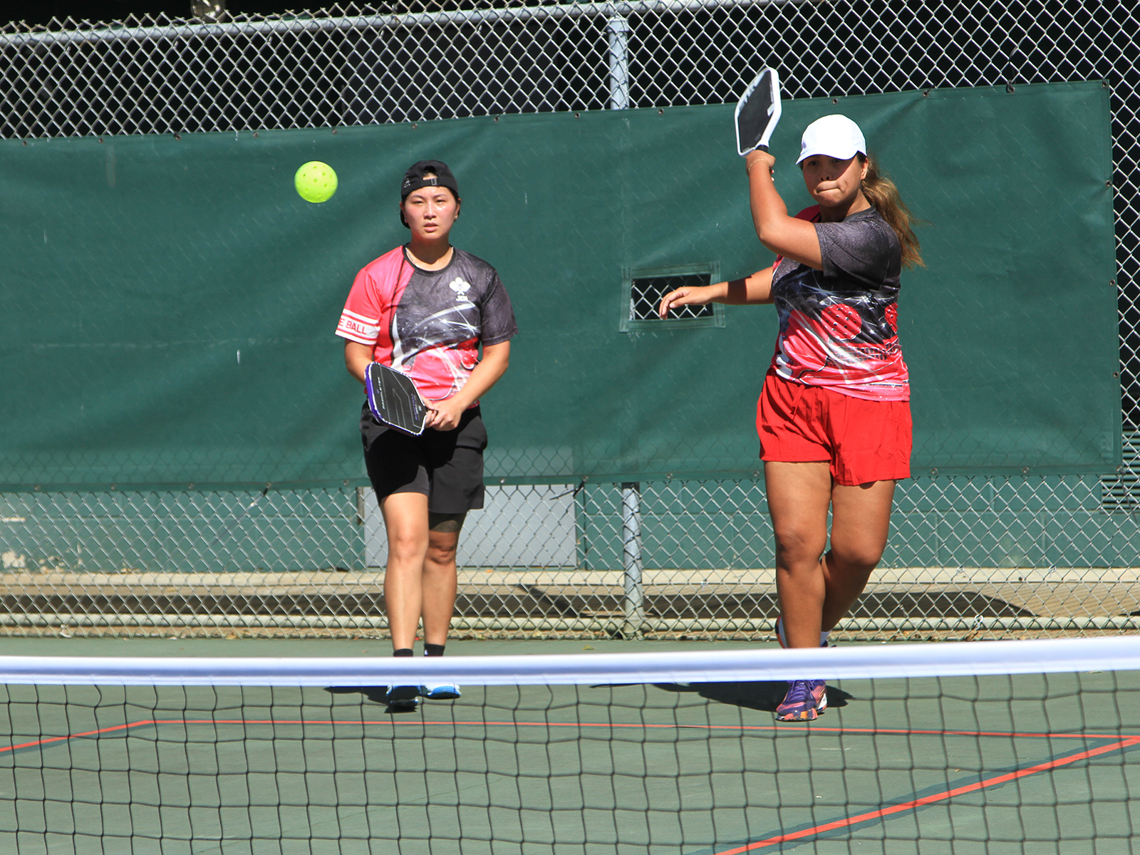 Pickleball players on court